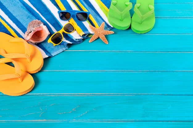 Free Photo | Beach items above a blue plank
