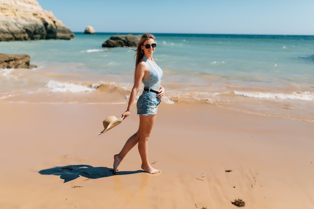 Free Photo Beach Vacation Beautiful Woman In Sunhat Enjoying Perfect