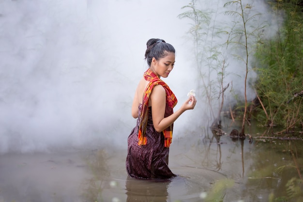 Premium Photo Beautiful Asian Women Are Bathing In The River