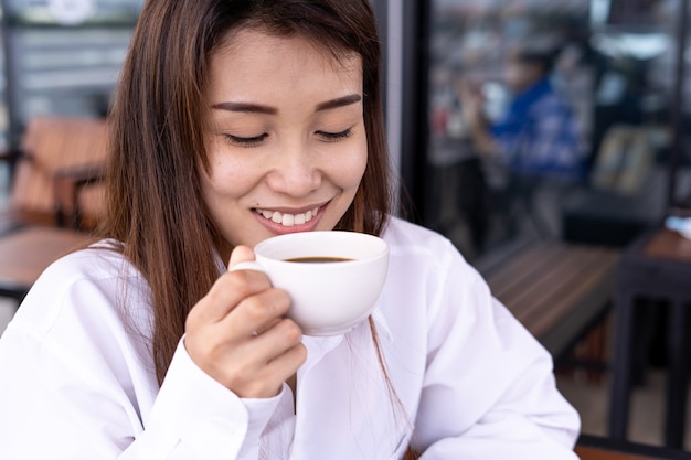 Premium Photo | Beautiful asian women drink coffee or tea in relaxation ...