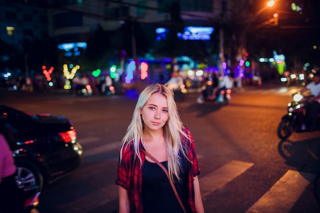 Premium Photo | Beautiful blonde girl on background night road in asia