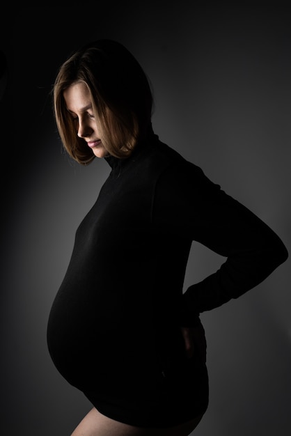 Premium Photo | Beautiful blonde pregnant woman studio portrait