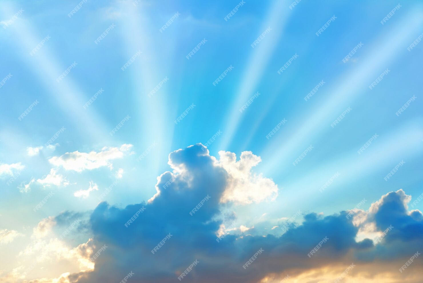 Premium Photo | Beautiful blue sky with sunbeams and clouds