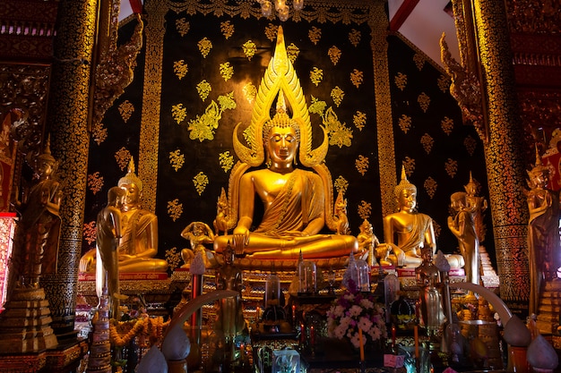 Premium Photo | Beautiful buddha chinnarat coated with gold plate in ...