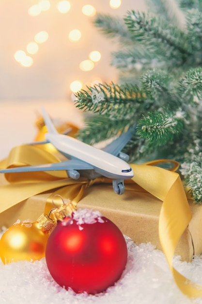 Premium Photo | Beautiful christmas background with airplane