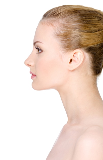 Free Photo | Beautiful clean young woman's face in profile - isolated ...