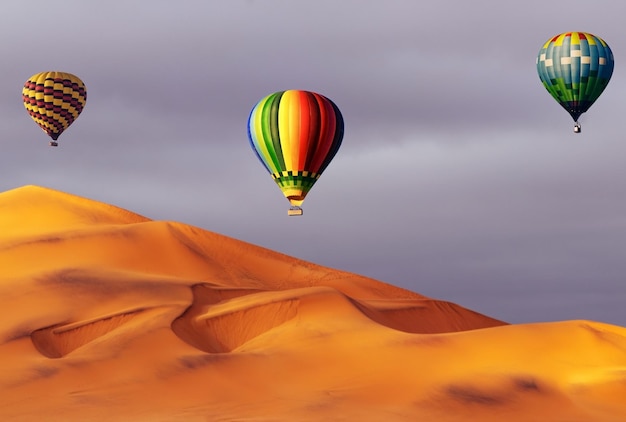 Premium Photo | Beautiful colorful hot air baloons and dramatic clouds ...