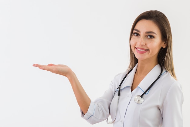 Beautiful doctor raising his hands | Free Photo