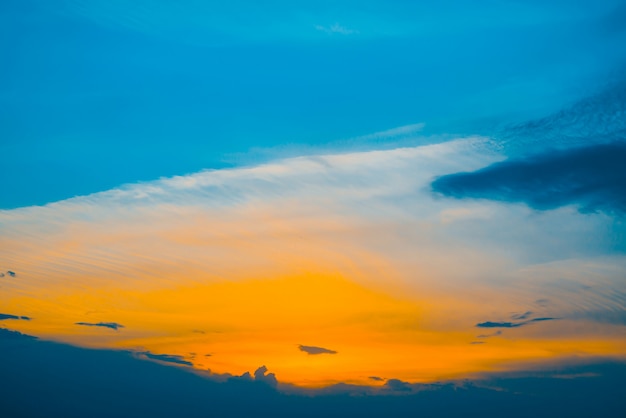 Premium Photo | Beautiful early blue cloudy sky with orange sunlight ...