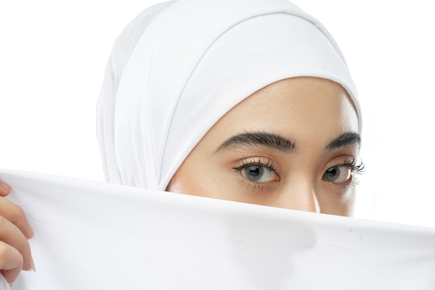 Premium Photo | Beautiful eyes of hijab woman in white veil with a cloth