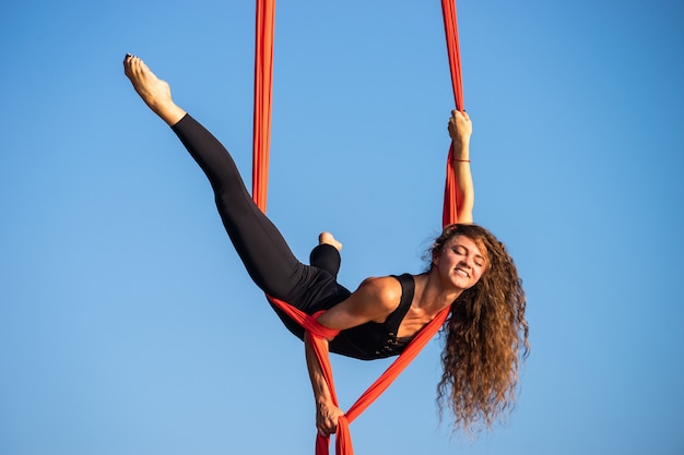 Premium Photo Beautiful And Flexible Female Circus Artist Dancing