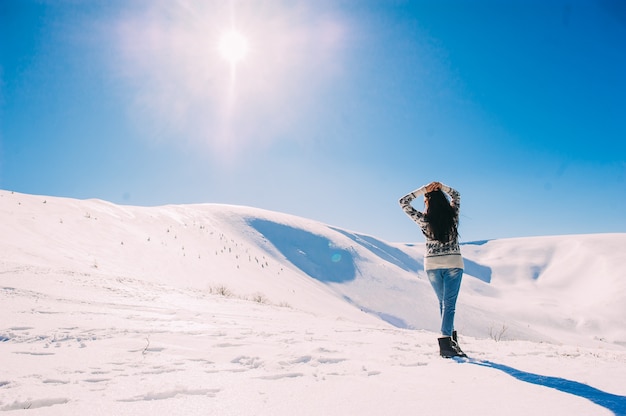 Premium Photo | Beautiful girl enjoying the sun, winter day in the ...