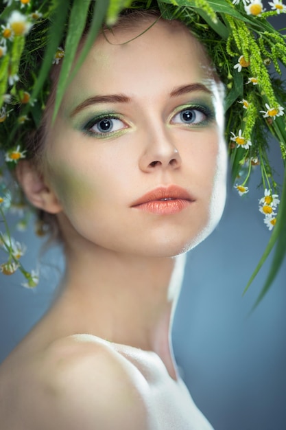 Premium Photo Beautiful Girl Wearing A Wreath Of Wildflowers 0319