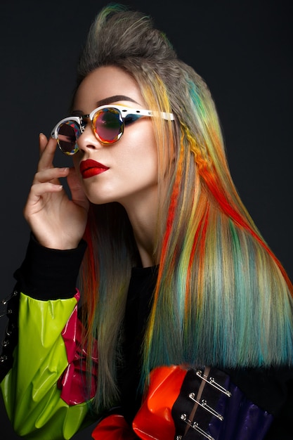 Beautiful Girl With Multicolored Hair And Creative Makeup And