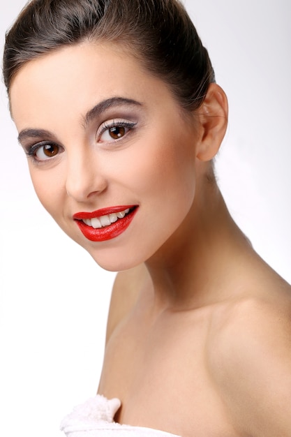 Beautiful girl with perfect skin and red lipstick Free Photo