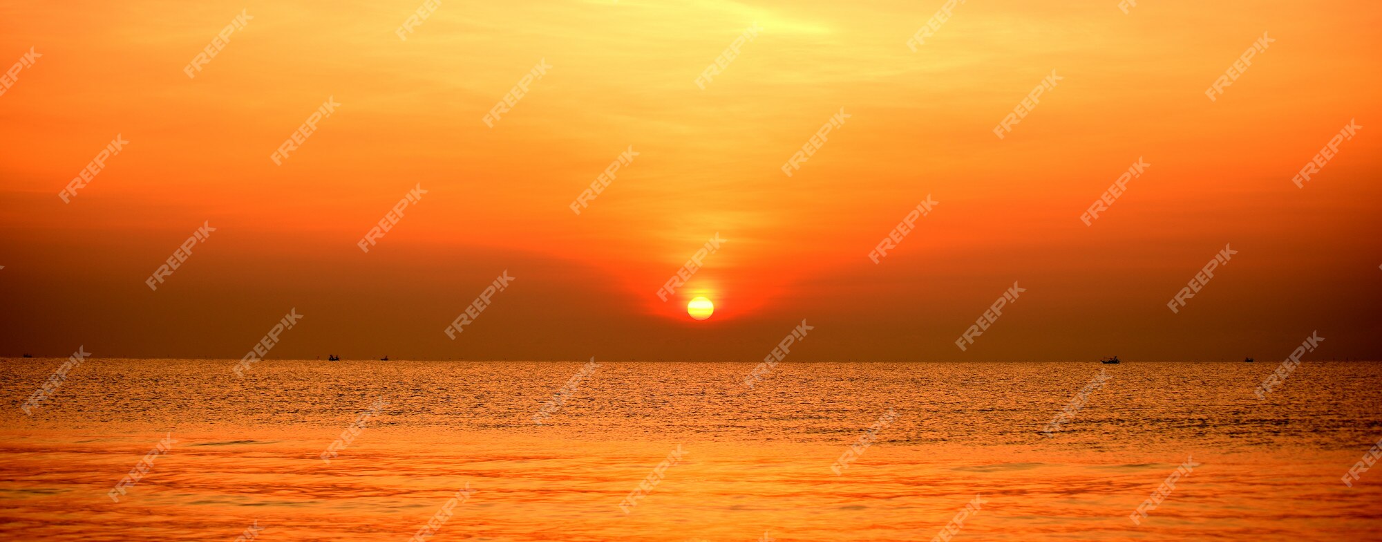 Premium Photo | Beautiful golden yellow sky and sun the view of the ...