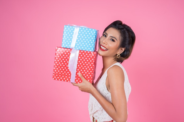 Free Photo | Beautiful happy woman with surprise gift box