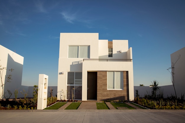 Beautiful house with minimalist architecture, sunny day Premium Photo