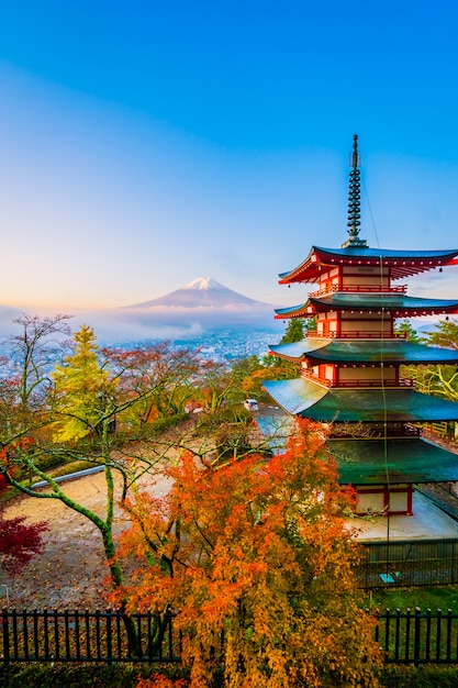 Beautiful landscape of mountain fuji with chureito pagoda around maple leaf tree in autumn season Free Photo