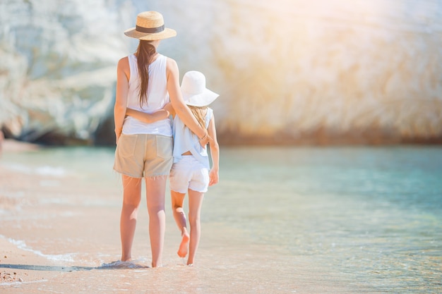 Premium Photo Beautiful Mother And Daughter At Caribbean Beach Enjoying Summer Vacation 2581