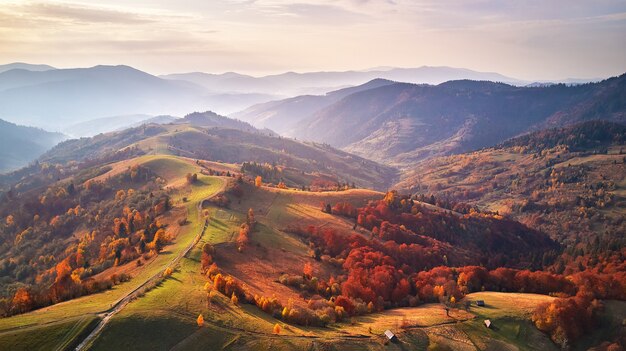 Premium Photo | Beautiful mountain autumn landscape with meadow and ...