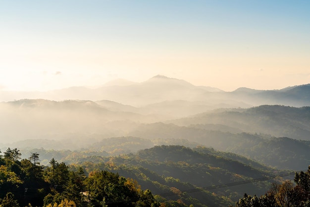 Premium Photo | Beautiful mountain layer with clouds and sunrise at ...