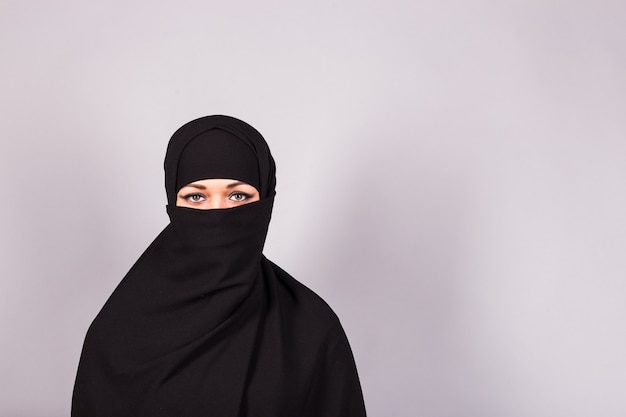 Premium Photo | Beautiful muslim girl wearing black burqa closeup.