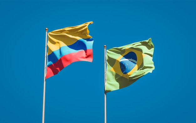 Premium Photo Beautiful National State Flags Of Brasil And Colombia Together On Blue Sky