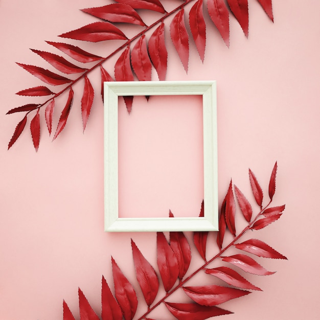 Beautiful Red Border Leaves On Pink Background With Blank Frame