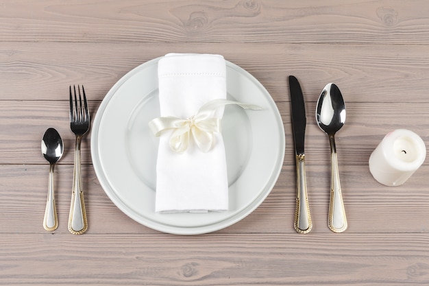 Beautiful rustic table setting on wooden table Premium Photo