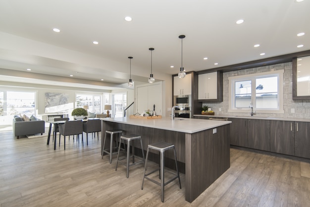 Beautiful shot of a modern house kitchen and dining room Free Photo