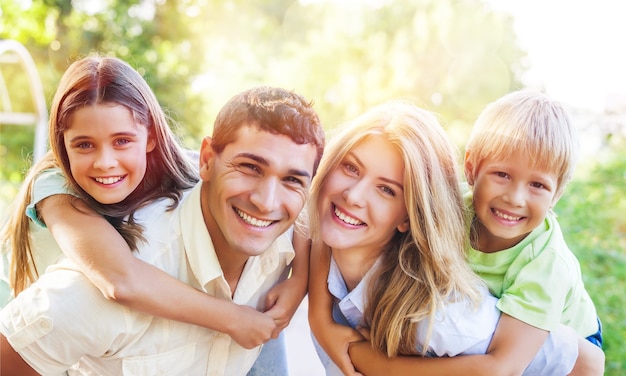 Premium Photo | Beautiful smiling lovely family on background