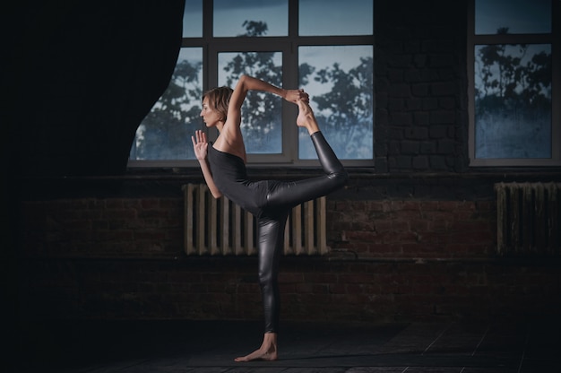 Premium Photo | Beautiful sporty fit yogi woman practices yoga asana ...