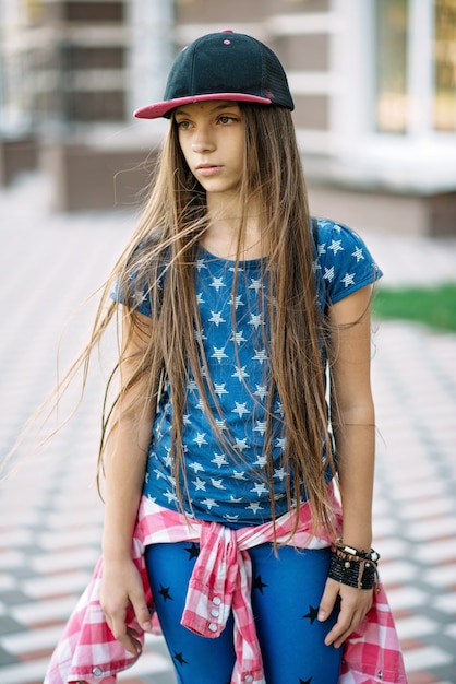 stylish girl with cap