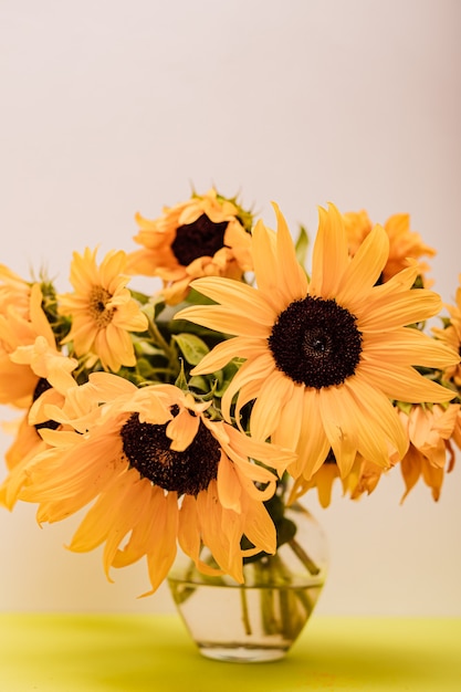 Premium Photo | Beautiful sunflowers in a glass vase