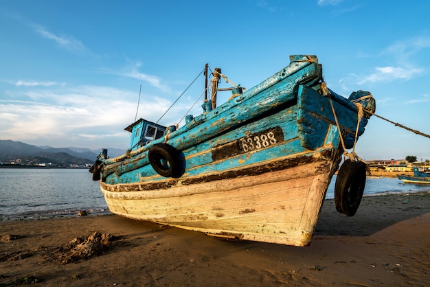 Premium Photo Beautiful Sunrise On An Old Wooden Fishing Boat On The