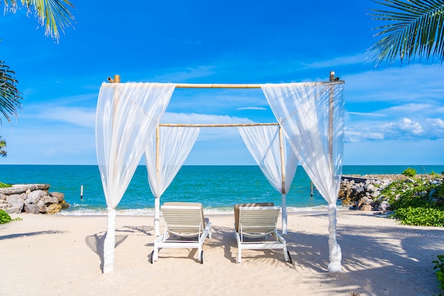 Beautiful Umbrella And Chair Around Beach Sea Ocean With