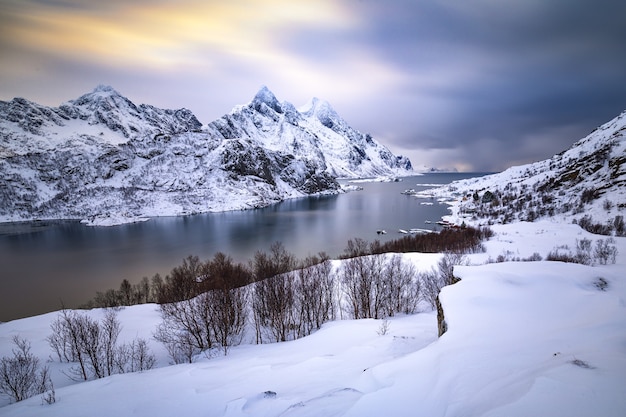 Free Photo Beautiful Winter Landscape With Snow Mountains And Icy Water