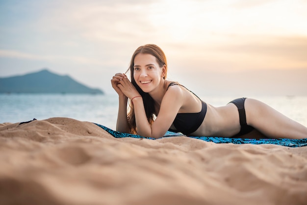 woman in black swimsuit