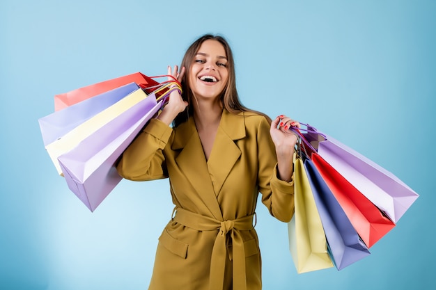 Premium Photo Beautiful Woman Holding Colorful Shopping Bags Isolated