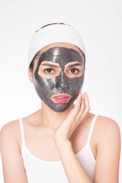 Premium Photo | Beautiful woman masking her face on white background