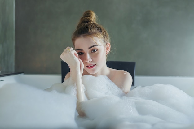 Beautiful Woman Relaxing In Bubble Foam Bath Photo Premium Download
