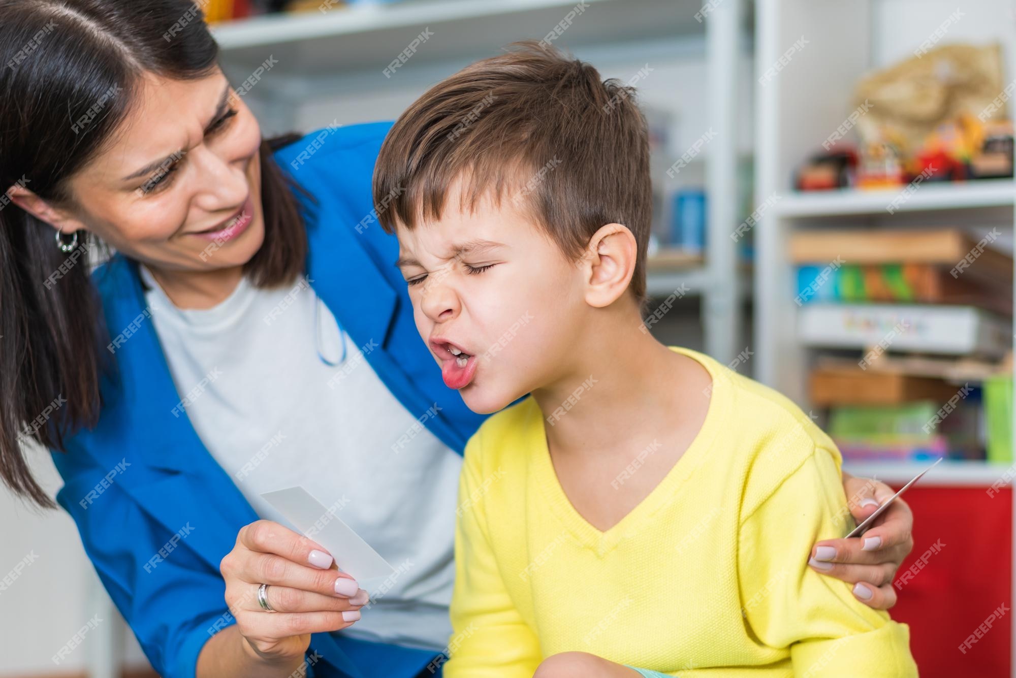 premium-photo-beautiful-woman-speech-therapist-teaches-boy-the