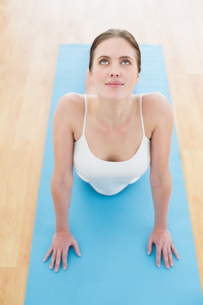 Premium Photo Beautiful Woman Stretching On Exercise Mat 