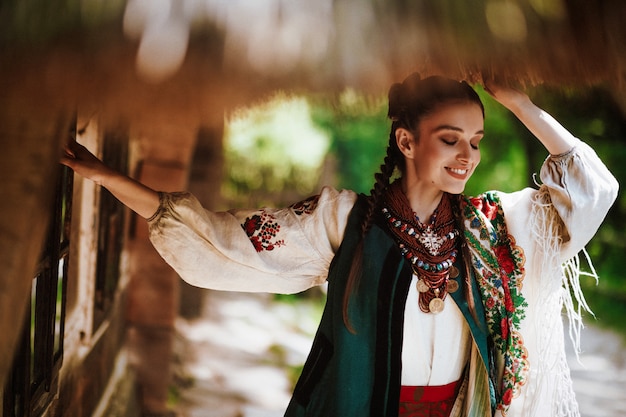 https://image.freepik.com/free-photo/beautiful-woman-traditional-ukrainian-dress-smiles_8353-9947.jpg