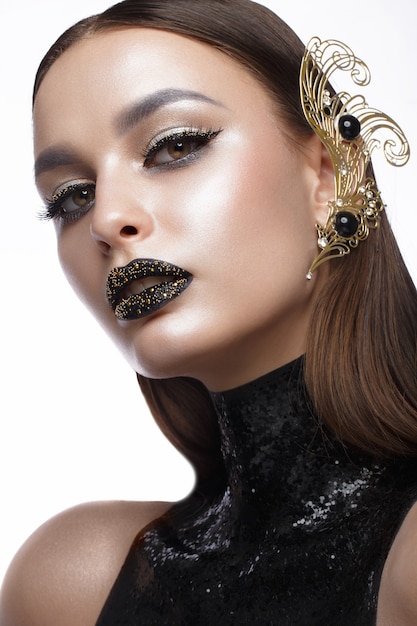 Premium Photo Beautiful Woman With Black Creative Art Make Up And Gold Accessories