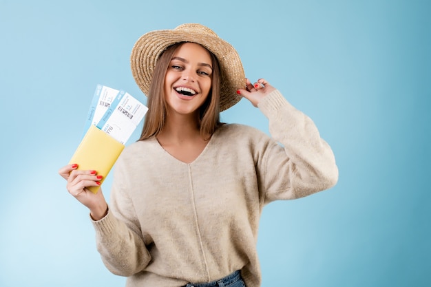 Premium Photo | Beautiful woman with boarding pass plane tickets in ...