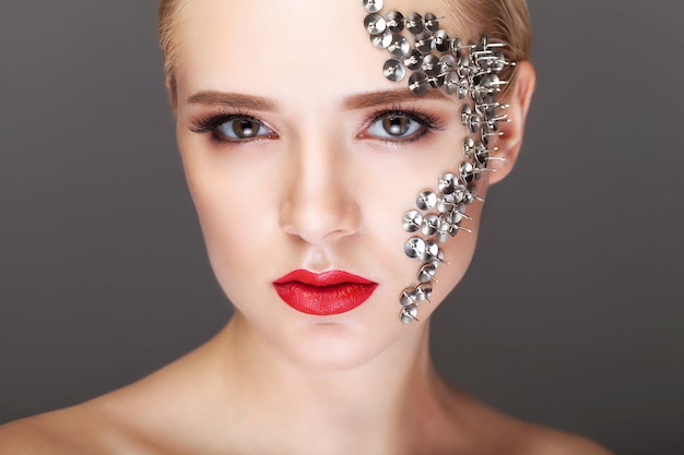Beautiful woman with hair styling and creative makeup Premium Photo
