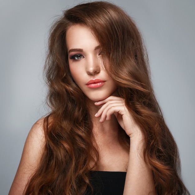 Premium Photo | Beautiful woman with long glossy hair