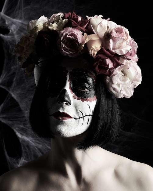https://image.freepik.com/free-photo/beautiful-woman-with-traditional-mexican-death-mask-calavera-catrina-sugar-skull-makeup-woman-dressed-wreath-roses_116441-7030.jpg